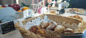 a basket of different types of pastries on a table at Hotel Sereno in Sestri Levante