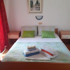 Postel nebo postele na pokoji v ubytování Apartments Markota