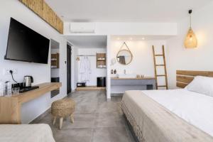 Cama ou camas em um quarto em Summer Village of Hippokrates - Adults only