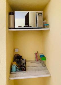 Kuchyň nebo kuchyňský kout v ubytování Suite Privada Com Varanda, Condominio VilaZion, Arraial D'Ajuda centro