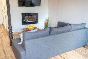 Posezení v ubytování Apartamentos Cama del Rey 2 habitaciones + 17 fotografií
