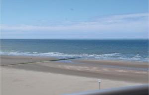 a view of a beach with the ocean at Residentie Zon & Zee Ref 20 in Ostend