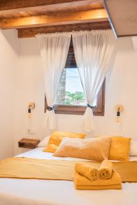 Postel nebo postele na pokoji v ubytování Apartamentos Cama del Rey 2 habitaciones