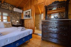 Postel nebo postele na pokoji v ubytování Kefalonian Luxury Villas + 37 fotografií