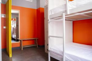 a room with two bunk beds and a desk at Room Valencia in Valencia
