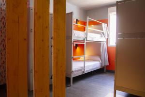 a small room with two bunk beds in it at Room Valencia in Valencia