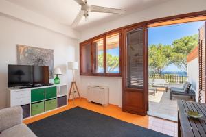 Et tv og/eller underholdning på Le Casette all'Addaura by Domus Sicily