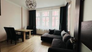 Posezení v ubytování Jurincom Apartment Deluxe