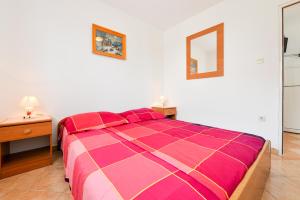 Postel nebo postele na pokoji v ubytování Apartments Antica - Edita