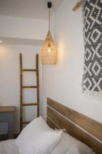 Cama ou camas em um quarto em Summer Village of Hippokrates - Adults only