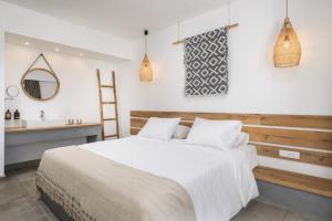 Cama ou camas em um quarto em Summer Village of Hippokrates - Adults only