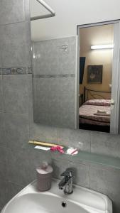 Koupelna v ubytování Albergo Fiorita