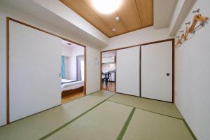 Fotografie z fotogalerie ubytování ホテル西川口ウィークリー v destinaci Kawaguči