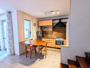 O bucătărie sau chicinetă la Dimora del Viaggiatore
