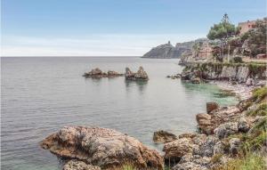 a large body of water with rocks in it at Casa Antonio in Mandra Capreria