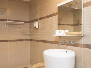 Ένα μπάνιο στο GreenTree Inn Wuhu Fangte Second Phase Nanxiang Wanshang Express Hotel