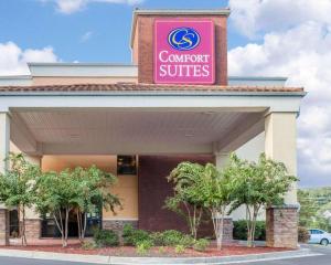 a sign on the front of a commercial building at Comfort Suites in Rome