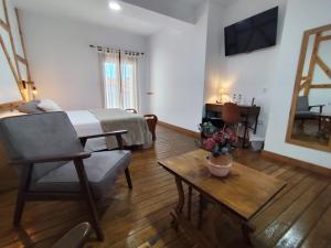 TV a/nebo společenská místnost v ubytování Casa Rural el Rincón de Monfragüe