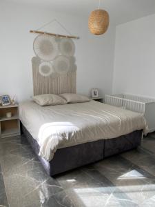 Ένα ή περισσότερα κρεβάτια σε δωμάτιο στο Villa piscine