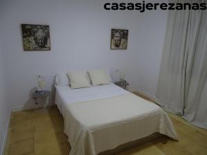 Posteľ alebo postele v izbe v ubytovaní Casasjerezanas Valerian