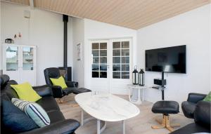 TV a/nebo společenská místnost v ubytování Holiday Home Astavej Løkken I + 17 fotografií