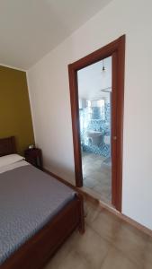 Postel nebo postele na pokoji v ubytování Blue Dolphin Guest House