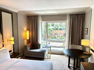 Postel nebo postele na pokoji v ubytování Hilton Munich City