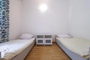 Voodi või voodid majutusasutuse Przystań Lubniewice - Duże Domki toas