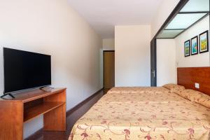 TV a/nebo společenská místnost v ubytování htop Palm Beach & SPA #htopEnjoy