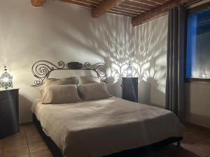 Кровать или кровати в номере Camping Les Framboiseilles
