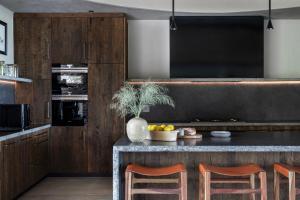 a kitchen with a counter with some fruit on it at Fifty-Five Mjejane in Hectorspruit +16 photos
