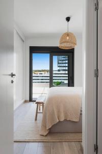 Ένα ή περισσότερα κρεβάτια σε δωμάτιο στο Luxury Apartment With Roof Terrace - Central Estepona +25 φωτογραφίες