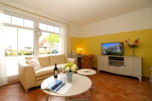 TV a/nebo společenská místnost v ubytování Villa Silva Fewo 5