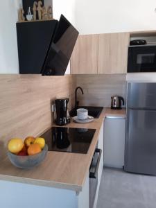 Kuchnia lub aneks kuchenny w obiekcie Apartmani Nila