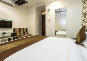Postel nebo postele na pokoji v ubytování Hotel Galaxy
