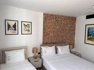 Postel nebo postele na pokoji v ubytování Treva Hotel & Apartaments