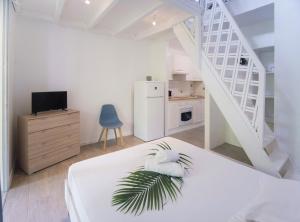 Kuchyň nebo kuchyňský kout v ubytování Résidence Ti'Kéol - Appartements avec terrasse 2 à 4 personnes, piscine