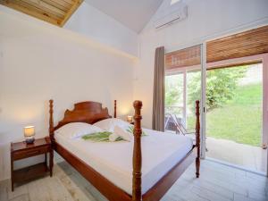 Postel nebo postele na pokoji v ubytování Résidence Ti'Kéol - Appartements avec terrasse 2 à 4 personnes, piscine + 37 fotografií