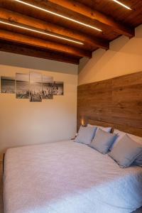Postel nebo postele na pokoji v ubytování CASA GIO.ANNA