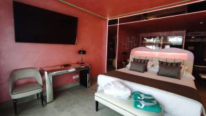Кровать или кровати в номере Hotel Ritual Torremolinos- Adults Only