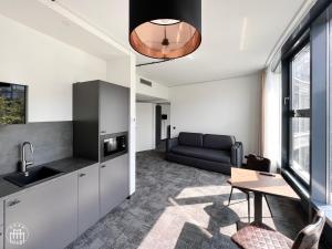 Kuchyň nebo kuchyňský kout v ubytování Hotel am Borsigturm