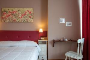 Postel nebo postele na pokoji v ubytování Ankon Hotel