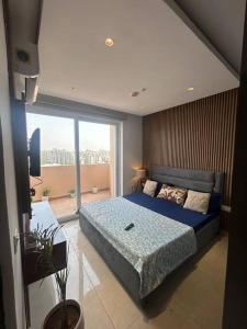 Ένα ή περισσότερα κρεβάτια σε δωμάτιο στο Luxury private 1bhk - Elegance Homes