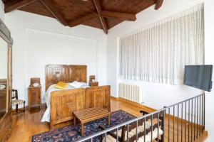 Posteľ alebo postele v izbe v ubytovaní Il Castellaro Country House