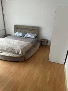 Postel nebo postele na pokoji v ubytování Apartmani Fenix
