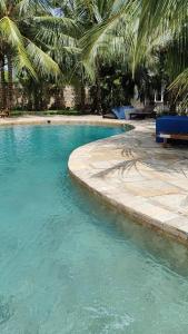 Πισίνα στο ή κοντά στο Diani Beach Cottage Apartment