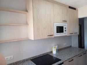 Kuchyň nebo kuchyňský kout v ubytování Miami APARTAMENTO THOMAS