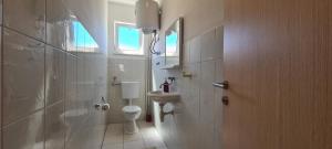 Kúpeľňa v ubytovaní Apartment Sime + 11 fotografií