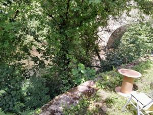 Taman di luar Le Petit Célé appartement T1 équipée
