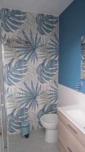 a bathroom with a toilet and a wall at Casa Vacanze Aurelia in Procida +45 photos